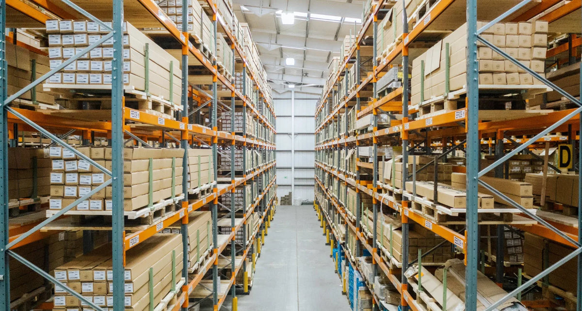 Wholesale warehouse aisle with stocked shelves